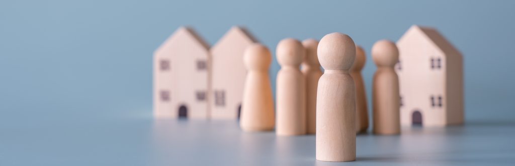 Small Wooden Faceless Figures Of Human Family Members And House